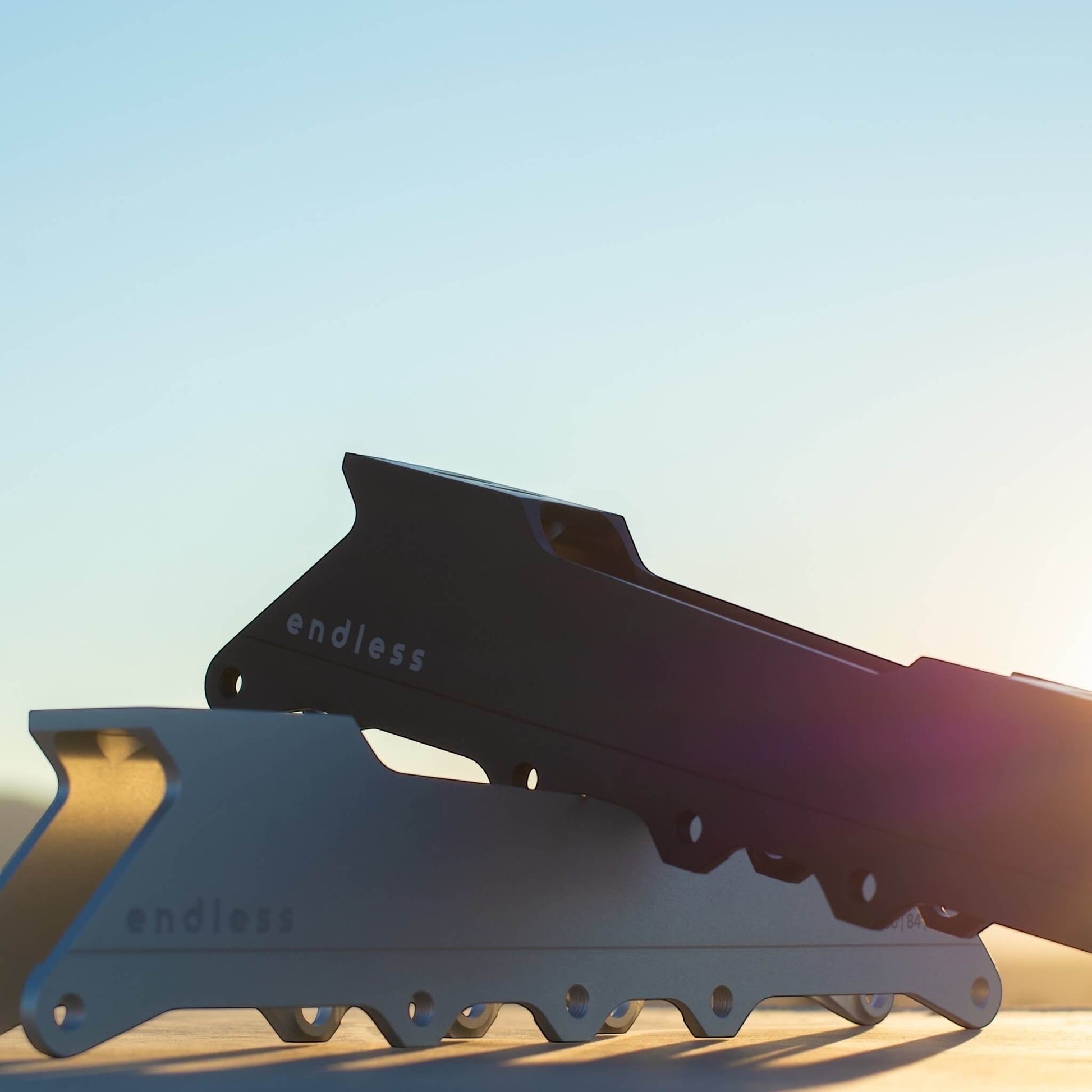 Endless Blading Co. 80 Classic frames in black and silver CNC-machined aluminum for urban and freeride skates.