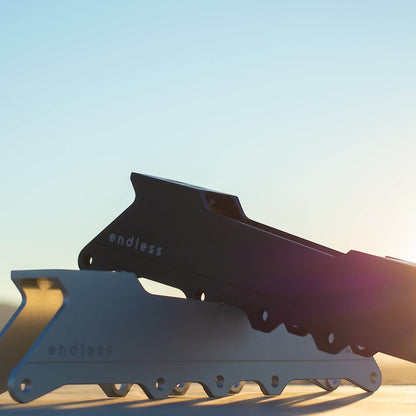 Endless Blading Co. 80 Classic frames in black and silver CNC-machined aluminum for urban and freeride skates.