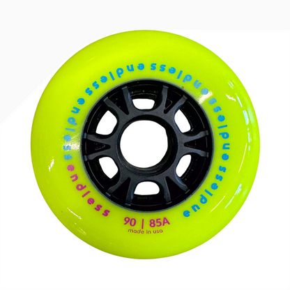 Endless Blading Co. 90mm 85A neon yellow inline skate wheel with a black high-performance core and bullet profile.