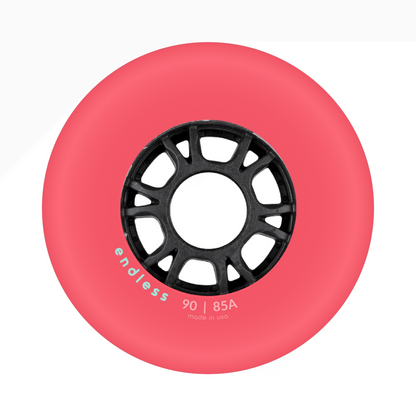 Endless Blading Co. 90mm 85A bullet profile inline skate wheel in pink with a black high-performance core