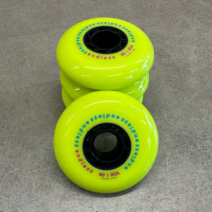Endless Blading Co. 80 mm neon yellow inline skate wheels with black cores and bullet profile for high performance