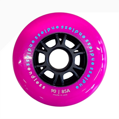 Endless Blading Co. 90mm 85A pink inline skate wheel with a black high-performance core and bullet profile