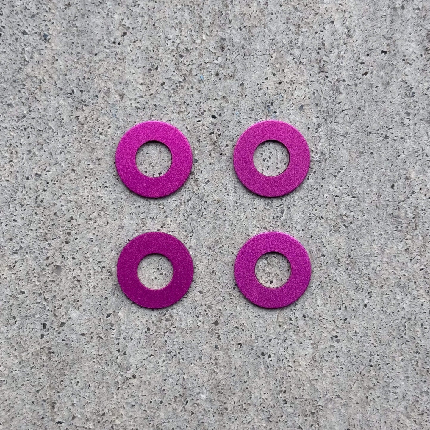 Endless Blading Co. pink aluminum Ultra Washers for inline skate frames