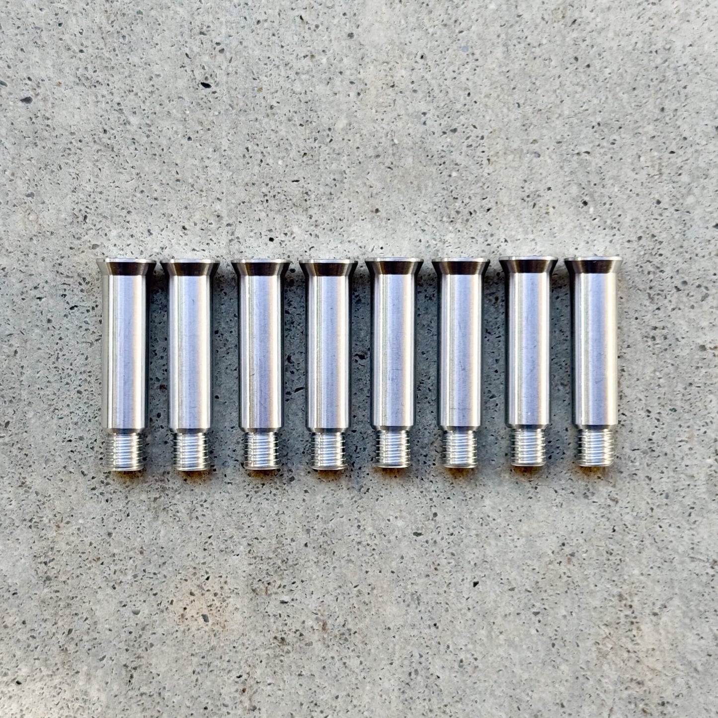 Endless Blading Co. silver aluminum Ultra Axles for inline skate frames.