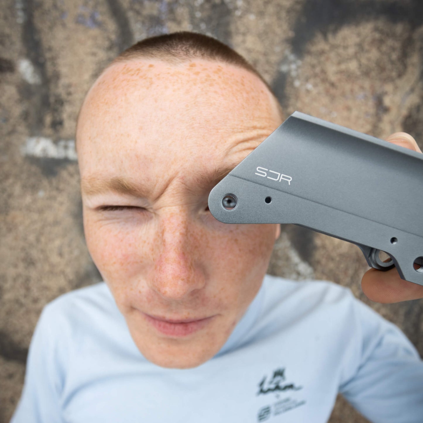 Endless Blading Co. SJR UFS frame held by Stephen Johnstone, featuring a matte grey CNC-machined aluminum design.