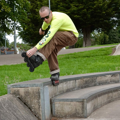 Skater wearing Endless Blading Co. SJR UFS frames performing a soul grind on a concrete ledge at a skate park